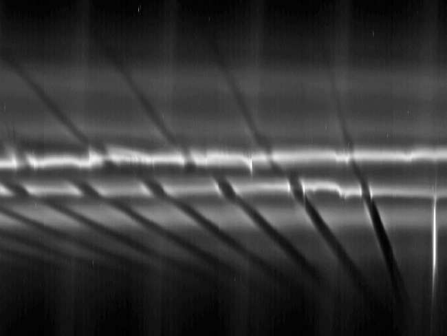 Saturn's Moon Triggers Giant Snowballs in Planet's Ring